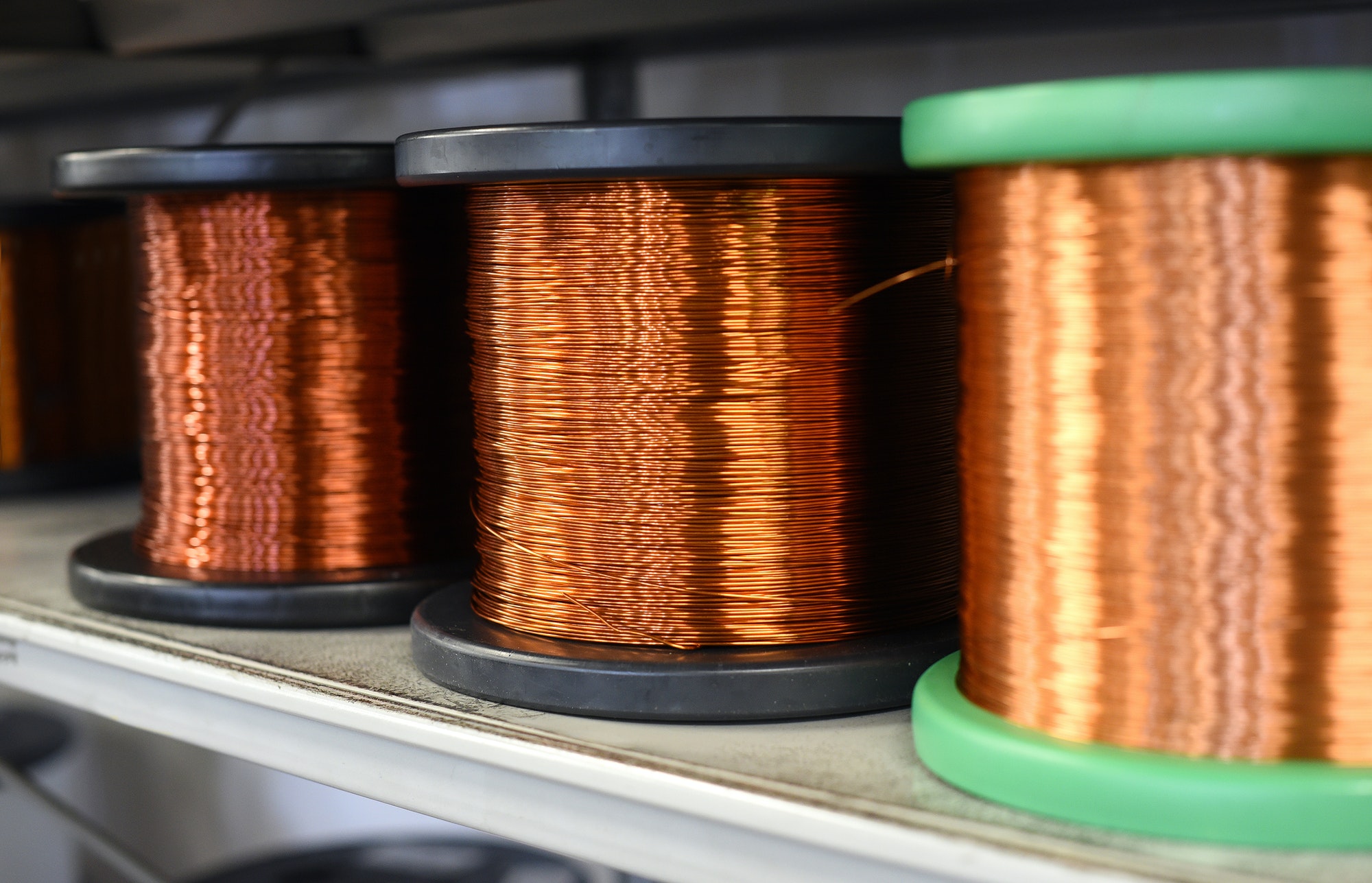 Row of copper wire coils in close up view